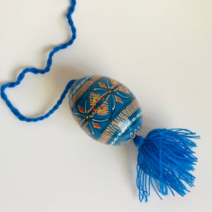 Pisanka, handpainted wooden egg on string