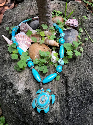 Turquoise necklace with turtle