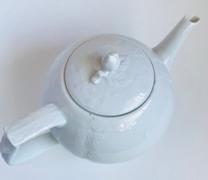 Vintage white tea pot