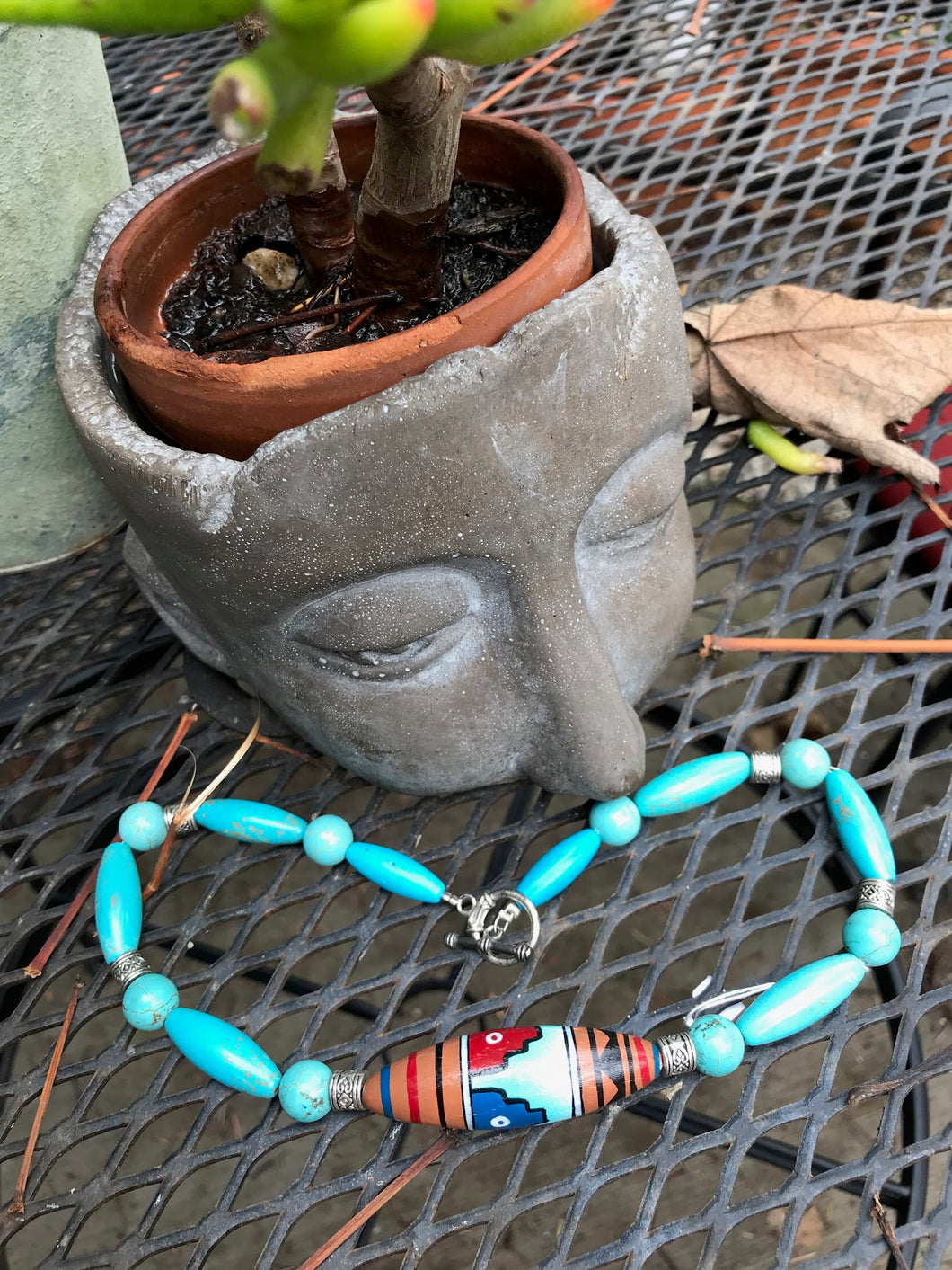 Turquoise necklace with bead