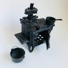 Load image into Gallery viewer, Vintage cast iron toy stove with 2 pots