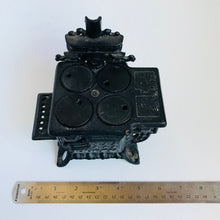 Load image into Gallery viewer, Vintage cast iron toy stove with 2 pots