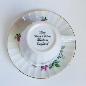 Vintage roses tea cup with saucer
