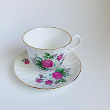 Load image into Gallery viewer, Vintage roses tea cup with saucer
