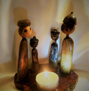 Tea-candle holder “Family around Fire”